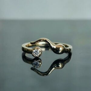 Gold Swirl Ring with Diamond Accent